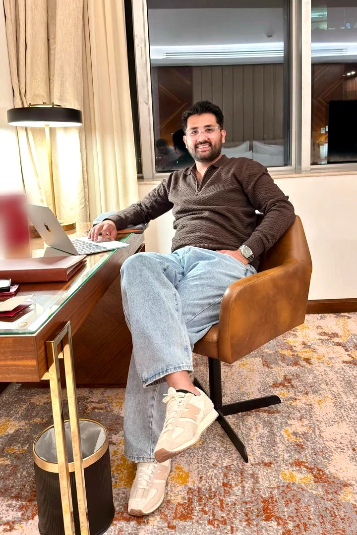 Raja Sheryar, founder and CEO of Sellwright Studio, at his desk